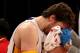 LOS ANGELES, CA - JANUARY 06: Pau Gasol #16 of the Los Angeles Lakers receives treatment after being cut on the nose in the game against the Denver Nuggets at Staples Center on January 6, 2013 in Los Angeles, California. The Nuggets won 112-105. NOTE TO USER: User expressly acknowledges and agrees that, by downloading and or using this photograph, User is consenting to the terms and conditions of the Getty Images License Agreement. (Photo by Stephen Dunn/Getty Images)