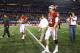 Jan 04, 2013; Arlington, TX, USA; Oklahoma Sooners quarterback Landry Jones (12) walks off the field after the loss against the Texas A&M Aggies in the 2013 Cotton Bowl at Cowboys Stadium. Mandatory Credit: Kevin Jairaj-USA TODAY Sports