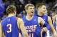 Nov 28, 2012; Omaha, NE, USA; Boise State Broncos forward Anthony Drmic (3) and guard Jeff Elorriaga (11) and guard Igor Hadziomerovic (12) celebrate their 83-70 win over the Creighton Bluejays at the CenturyLink Center. Mandatory Credit: Matt Ryerson-USA TODAY Sports