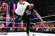 The Rock slams CM Punk. (Photo credit: WWE.com)