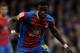 LONDON, ENGLAND - JANUARY 05: Wilfried Zaha of Crystal Palace runs with the ball during the FA Cup with Budweiser Third Round match between Crystal Palace and Stoke City at Selhurst Park on January 5, 2013 in London, England. (Photo by Christopher Lee/Getty Images)