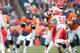 DENVER, CO - DECEMBER 30: Quarterback Peyton Manning #18 of the Denver Broncos drops back to pass against the Kansas City Chiefs at Sports Authority Field at Mile High on December 30, 2012 in Denver, Colorado. The Broncos defeated the Chiefs 38-3. (Photo by Dustin Bradford/Getty Images)