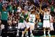 BOSTON, MA - JANUARY 9: Avery Bradley #0 of the Boston Celtics is congratulated by teammates on the bench after making a three-point shot against the Phoenix Suns during the game on January 9, 2013 at TD Garden in Boston, Massachusetts. NOTE TO USER: User expressly acknowledges and agrees that, by downloading and or using this photograph, User is consenting to the terms and conditions of the Getty Images License Agreement. (Photo by Jared Wickerham/Getty Images)