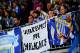 MALAGA, SPAIN - DECEMBER 22: Malaga CF fans protest against the decision of UEFA banned Malaga CF from the next Champions leage editon after failling to pay players wages and tax bills on time during the La Liga match between Malaga CF and Real Madrid CF at La Rosaleda Stadium on December 22, 2012 in Malaga, Spain. (Photo by David Ramos/Getty Images)