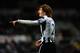 NEWCASTLE UPON TYNE, ENGLAND - DECEMBER 03: Newcastle player Fabricio Coloccini in action during the Barclays Premier League match between Newcastle United and Wigan Athletic at St James' Park on December 3, 2012 in Newcastle upon Tyne, England. (Photo by Stu Forster/Getty Images)