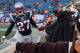 FOXBORO, MA - DECEMBER 30: Tavon Wilson #27 of the New England Patriots shakes hands with the Endzone Militia before a game with the Miami Dolphins at Gillette Stadium on December 30, 2012 in Foxboro, Massachusetts. (Photo by Jim Rogash/Getty Images)