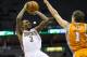 Jan 8, 2013; Milwaukee, WI, USA; Milwaukee Bucks guard Brandon Jennings (3) shoots against Phoenix Suns guard Goran Dragic (1) during the fourth quarter at the BMO Harris Bradley Center. The Bucks won 108-99. Mandatory Credit: Jeff Hanisch-USA TODAY Sports