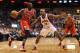 PHOENIX, AZ - NOVEMBER 14: Luol Deng #9 of the Chicago Bulls drives the ball against P.J. Tucker #17 of the Phoenix Suns during the NBA game at US Airways Center on November 14, 2012 in Phoenix, Arizona. The Bulls defeated the Suns 112-106 in overtime. NOTE TO USER: User expressly acknowledges and agrees that, by downloading and or using this photograph, User is consenting to the terms and conditions of the Getty Images License Agreement. (Photo by Christian Petersen/Getty Images)
