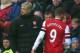 WIGAN, ENGLAND - DECEMBER 22: Lukas Podolski of Arsenal is substituted as Arsenal Manager Arsene Wenger looks on during the Barclays Premier League match between Wigan Athletic and Arsenal at the DW Stadium on December 22, 2012 in Wigan, England. (Photo by Clive Brunskill/Getty Images)