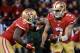 SAN FRANCISCO, CA - JANUARY 12: Quarterback Colin Kaepernick #7 of the San Francisco 49ers hands the ball to running back Frank Gore #21 against the Green Bay Packers during the NFC Divisional Playoff Game at Candlestick Park on January 12, 2013 in San Francisco, California. (Photo by Harry How/Getty Images)