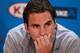 MELBOURNE, AUSTRALIA - JANUARY 12: Roger Federer of Switzerland speaks to the media ahead of the 2013 Australian Open at Melbourne Park on January 12, 2013 in Melbourne, Australia. (Photo by Robert Prezioso/Getty Images)