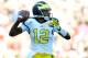 TAMPA, FL - JANUARY 1: Quarterback Devin Gardner #12 of the Michigan Wolverines passes in the fourth quarter against the South Carolina Gamecocks in the Outback Bowl January 1, 2013 at Raymond James Stadium in Tampa, Florida. South Carolina won 33 - 28. (Photo by Al Messerschmidt/Getty Images)