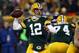 GREEN BAY, WI - JANUARY 05: Quarterback Aaron Rodgers #12 of the Green Bay Packers throws the ball in the third quarter against the Minnesota Vikings during the NFC Wild Card Playoff game at Lambeau Field on January 5, 2013 in Green Bay, Wisconsin. (Photo by Jonathan Daniel/Getty Images)