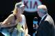 MELBOURNE, AUSTRALIA - JANUARY 14: Maria Sharapova of Russia talks to MC Craig Willis after winning her first round match against Olga Puchkova of Russia during day one of the 2013 Australian Open at Melbourne Park on January 14, 2013 in Melbourne, Australia. (Photo by Michael Dodge/Getty Images)