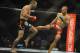 Jan 12, 2013; Oklahoma City, OK, USA; Nate Marquardt (black shorts) and Tarec Saffiedine (red and black shorts) in their Strikeforce MMA Welterweight Title bout at the Chesapeake Energy Arena. Mandatory Credit: Mark D. Smith-USA TODAY Sports
