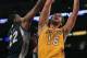 LOS ANGELES, CA - NOVEMBER 02: Pau Gasol #16 of the Los Angeles Lakers drives to the basket while being defended by Rudy Gay #22 of the Memphis Grizzlies during the first quarter at Staples Center on November 2, 2010 in Los Angeles, California. NOTE TO USER: User expressly acknowledges and agrees that, by downloading and or using this photograph, User is consenting to the terms and conditions of the Getty Images License Agreement. (Photo by Jeff Gross/Getty Images)