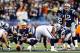 FOXBORO, MA - JANUARY 13: Tom Brady #12 of the New England Patriots makes an adjustment against the Houston Texans during the 2013 AFC Divisional Playoffs game at Gillette Stadium on January 13, 2013 in Foxboro, Massachusetts. (Photo by Jared Wickerham/Getty Images)