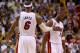 MIAMI, FL - JANUARY 04: Dwyane Wade #3 and LeBron James #6 of the Miami Heat high five during a game against the Chicago Bulls at AmericanAirlines Arena on January 4, 2013 in Miami, Florida. (Photo by Mike Ehrmann/Getty Images)