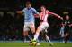 MANCHESTER, ENGLAND - JANUARY 01: Edin Dzeko of Manchester City competes with Geoff Cameron of Stoke City during the Barclays Premier League match between Manchester City and Stoke City at the Etihad Stadium on January 1, 2013 in Manchester, England. (Photo by Michael Regan/Getty Images)