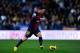MALAGA, SPAIN - JANUARY 13: Lionel Messi of FC Barcelona runs with the ball during the La Liga match between Malaga CF and FC Barcelona at La Rosaleda Stadium on January 13, 2013 in Malaga, Spain. (Photo by David Ramos/Getty Images)