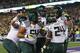 GLENDALE, AZ - JANUARY 03: Kenjon Barner #24 of the Oregon Ducks celebrates his second quarter touchdown against the Kansas State Wildcats with teammates during the Tostitos Fiesta Bowl at University of Phoenix Stadium on January 3, 2013 in Glendale, Arizona. (Photo by Stephen Dunn/Getty Images)