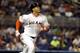 MIAMI, FL - SEPTEMBER 04: Giancarlo Stanton #27 of the Miami Marlins hits a home run against the Milwaukee Brewers at Marlins Park on September 4, 2012 in Miami, Florida. (Photo by Marc Serota/Getty Images)