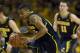 Jan 17, 2013; Minneapolis, MN, USA; Michigan Wolverines guard Trey Burke (12) breaks for the basket after a steal in the first half against the Minnesota Golden Gophers at Williams Arena. Mandatory Credit: Marilyn Indahl-USA TODAY Sports