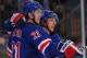 NEW YORK, NY - JANUARY 19: Derek Stepan #21 and Carl Hagelin #62 of the New York Rangers celebrate Hagelin's goal against Marc-Andre Fleury #29 of the Pittsburgh Penguins during their game on January 19, 2012 at Madison Square Garden in New York City, New York. (Photo by Al Bello/Getty Images)