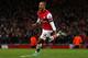 LONDON, ENGLAND - DECEMBER 29: Theo Walcott of Arsenal celebrates scoring their fourth goal during the Barclays Premier League match between Arsenal and Newcastle United at the Emirates Stadium on December 29, 2012 in London, England. (Photo by Clive Mason/Getty Images)