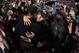Jim and John Harbaugh, brothers and rivals in embrace.