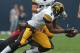 CHICAGO, IL - SEPTEMBER 01: Keenan Davis #6 of the Iowa Hawkeyes catches a pass as he is hit by Rashaan Melvin #11 of the Northern Illinois Huskies at Soldier Field on September 1, 2012 in Chicago, Illinois. (Photo by Jonathan Daniel/Getty Images)