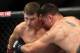 September 22, 2012; Toronto, ON, CANADA; Michael Bisping (left) grapples with Brian Stann (right) in the middleweight championship during UFC 152 at the Air Canada Centre. Mandatory Credit: Tom Szczerbowski-USA TODAY Sports