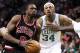 Jan 18, 2013; Boston, MA, USA; Chicago Bulls small forward Luol Deng (left) drives to the basket against Boston Celtics small forward Paul Pierce (34) during the first half at TD Garden. Mandatory Credit: Mark L. Baer-USA TODAY Sports