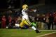 SAN FRANCISCO, CA - JANUARY 12: Running back DuJuan Harris #26 of the Green Bay Packers runs the ball in for a touchdown against the San Francisco 49ers in the second quarter during the NFC Divisional Playoff Game at Candlestick Park on January 12, 2013 in San Francisco, California. (Photo by Harry How/Getty Images)