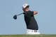 ABU DHABI, UNITED ARAB EMIRATES - JANUARY 20: Jamie Donaldson of Wales hits his tee shot on the third hole during the final round of the Abu Dhabi HSBC Golf Championship at Abu Dhabi Golf Club on January 20, 2013 in Abu Dhabi, United Arab Emirates. (Photo by Scott Halleran/Getty Images)