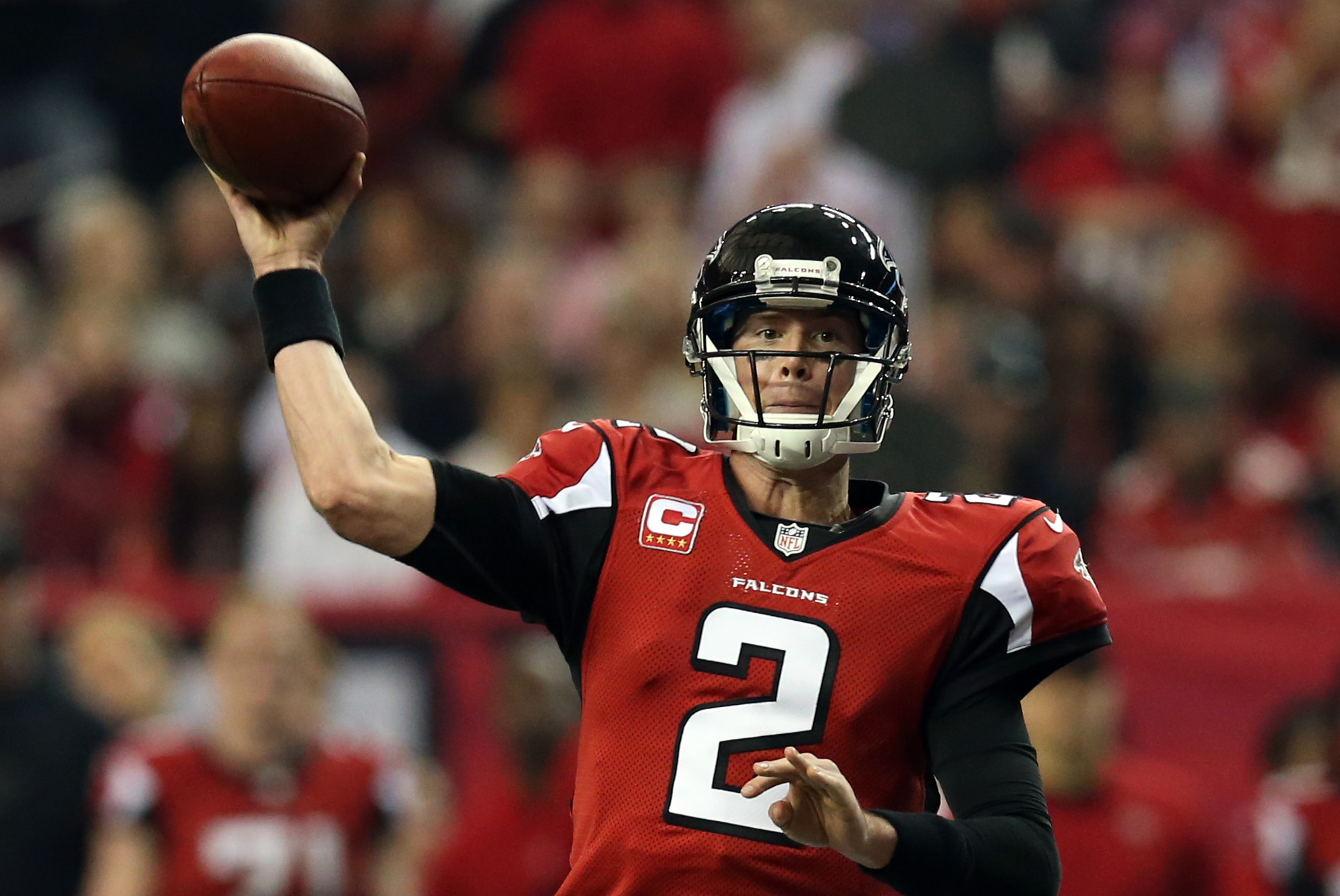 27 September 2009. Atlanta Falcons Running Back Matt Ryan (2) out of the  pocket in the first quarter. The New England Patriots defeated the Atlanta  Falcons 26 to 10 in week 3