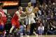 Jan 5, 2013; San Antonio, TX, USA; San Antonio Spurs forward Tim Duncan (21) posts up against Philadelphia 76ers center Spencer Hawes (left) during the second half at the AT&T Center. The Spurs won 109-86. Mandatory Credit: Soobum Im-USA TODAY Sports