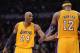 LOS ANGELES, CA - DECEMBER 28: Kobe Bryant #24 of the Los Angeles Lakers jokes with Dwight Howard #12 during the game against the Portland Trail Blazers at Staples Center on December 28, 2012 in Los Angeles, California. The Lakers won 104-87. NOTE TO USER: User expressly acknowledges and agrees that, by downloading and or using this photograph, User is consenting to the terms and conditions of the Getty Images License Agreement. (Photo by Harry How/Getty Images)
