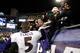 FOXBORO, MA - JANUARY 20: Joe Flacco #5 of the Baltimore Ravens celebrates after defeating the New England Patriots in the 2013 AFC Championship game at Gillette Stadium on January 20, 2013 in Foxboro, Massachusetts. The Baltimore Ravens defeated the New England Patriots 28-13. (Photo by Jim Rogash/Getty Images)