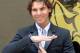 SITGES, SPAIN - NOVEMBER 26: Rafael Nadal attends a press conference for 'Champions Drink Responsibly' by Bacardi on November 26, 2012 in Sitges, Spain. (Photo by Robert Marquardt/Getty Images)