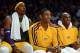 LOS ANGELES, CA - DECEMBER 28: (L-R) Dwight Howard #12, Metta World Peace #15 and Kobe Bryant #24 of the Los Angeles Lakers smile on the bench during the game against the Portland Trail Blazers at Staples Center on December 28, 2012 in Los Angeles, California. The Lakers won 104-87. NOTE TO USER: User expressly acknowledges and agrees that, by downloading and or using this photograph, User is consenting to the terms and conditions of the Getty Images License Agreement. (Photo by Harry How/Getty Images)