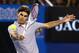 MELBOURNE, AUSTRALIA - JANUARY 21: Roger Federer of Switzerland plays a backhand in his fourth round match against Milos Raonic of Canada during day eight of the 2013 Australian Open at Melbourne Park on January 21, 2013 in Melbourne, Australia. (Photo by Mark Kolbe/Getty Images)