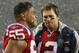 FOXBORO, MA - OCTOBER 18: Tom Brady #12 and Junior Seau #55 of the New England Patriots stand on the sideline in the fourth quarter against the Tennessee Titans on October 18, 2009 at Gillette Stadium in Foxboro, Massachusetts. The Patriots defeated the Titans 59-0. (Photo by Elsa/Getty Images)