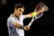MELBOURNE, AUSTRALIA - JANUARY 23: Roger Federer of Switzerland plays a backhand in his Quarterfinal match against Jo-Wilfred Tsonga of France during day ten of the 2013 Australian Open at Melbourne Park on January 23, 2013 in Melbourne, Australia. (Photo by Ryan Pierse/Getty Images)