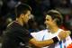 Novak Djokovic and David Ferrer meet at the net after their 2012 U.S. Open semifinal, which Djokovic won in four sets.