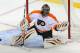 Jan 22, 2013; Newark, NJ, USA; Philadelphia Flyers goalie Ilya Bryzgalov (30) makes a save during the second period of their game against the New Jersey Devils at the Prudential Center. Mandatory Credit: Ed Mulholland-USA TODAY Sports
