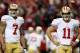 ATLANTA, GA - JANUARY 20: Quarterbacks Colin Kaepernick #7 and quarterback Alex Smith #11 of the San Francisco 49ers warm up before taking on the Atlanta Falcons in the NFC Championship game at the Georgia Dome on January 20, 2013 in Atlanta, Georgia. (Photo by Streeter Lecka/Getty Images)