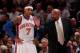 NEW YORK, NY - MARCH 14: (R) Mike Woodson the interim head coach of the New York Knicks coaches (L) Carmelo Anthony #7 of the New York Knicks during the game against the Portland Trailblazers at Madison Square Garden on March 14, 2012 in New York City. NOTE TO USER: User expressly acknowledges and agrees that, by downloading and/or using this Photograph, user is consenting to the terms and conditions of the Getty Images License Agreement. (Photo by Chris Trotman/Getty Images)