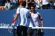 NEW YORK, NY - SEPTEMBER 09: Novak Djokovic of Serbia shakes hands with David Ferrer of Spain after their men's singles semifinal match on Day Fourteen of the 2012 US Open at USTA Billie Jean King National Tennis Center on September 9, 2012 in the Flushing neighborhood of the Queens borough of New York City. (Photo by Elsa/Getty Images)