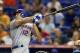 Oct. 3, 2012; Miami, FL, USA; New York Mets left fielder Scott Hairston (12) at bat against the Miami Marlins at Marlins Park. The Mets won 4-2. Mandatory Credit: Steve Mitchell-USA TODAY Sports